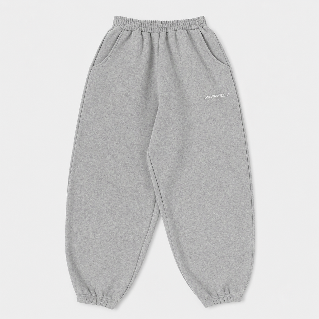 Gray sweatpants with a brand logo on a light gray background