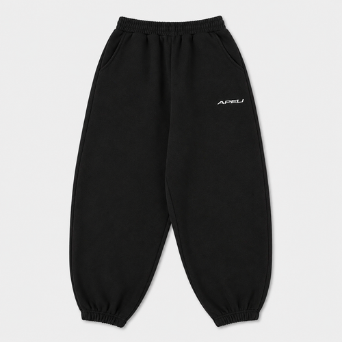 Black sweatpants with a brand logo on a light gray background
